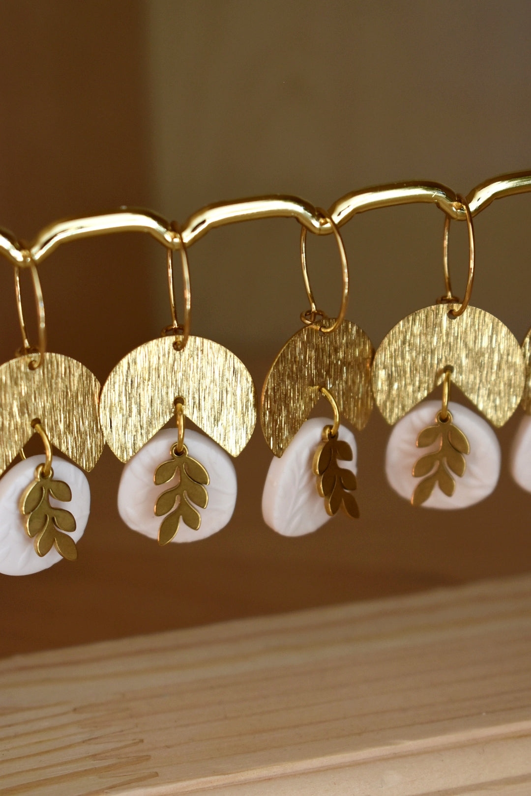 White and gold foliage earrings