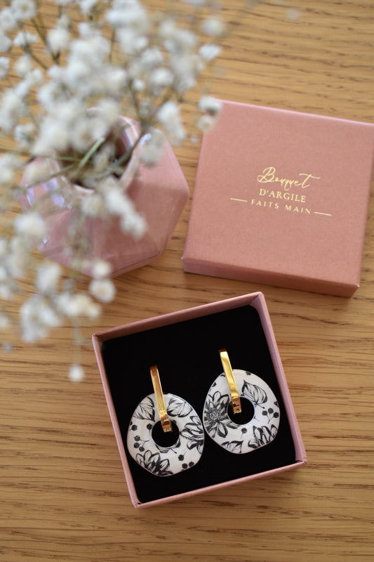 Pampilles motif fleurs noir et blanc